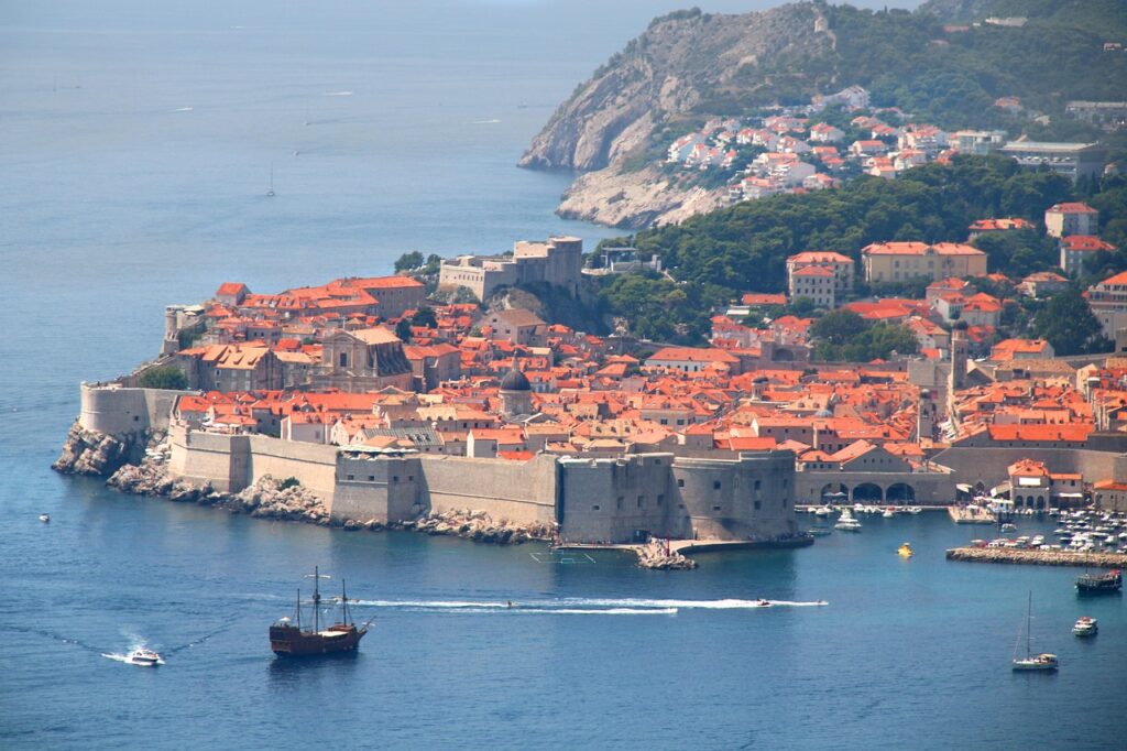 Historic wall of Dubrovnik and its crystalline water. Dubrovnik, Croatia