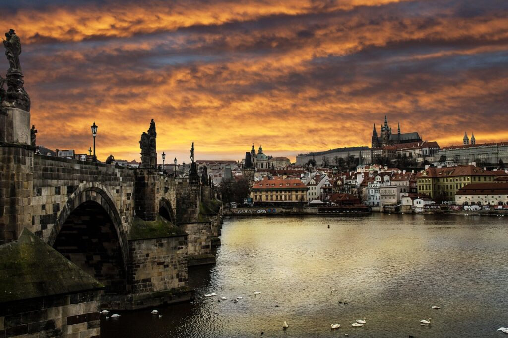 a sunset view of the city and bridge. Prague, Czech Republic