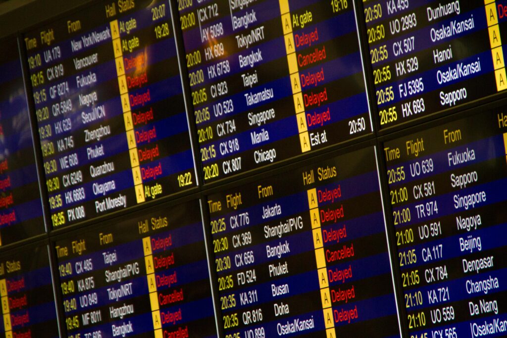 flight information display board at an airport