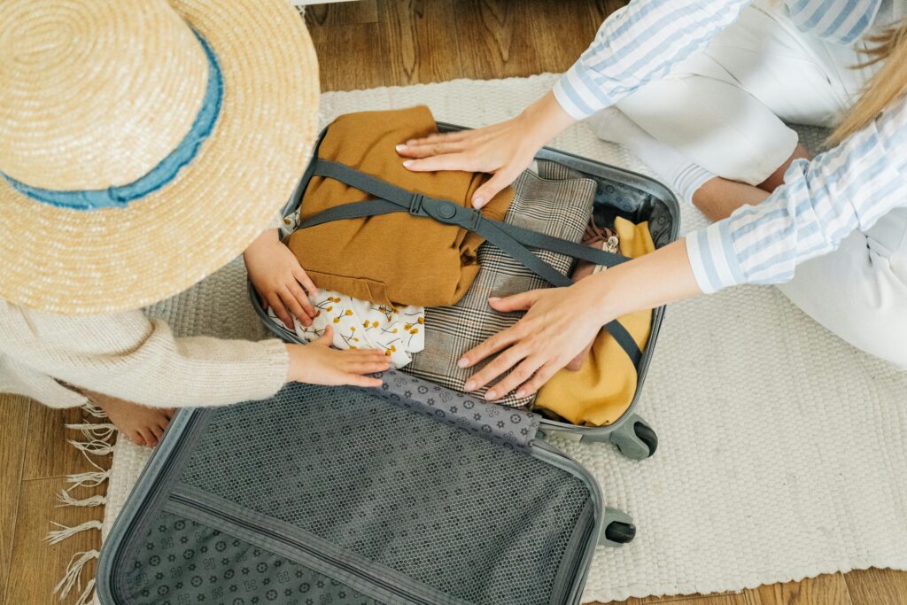 A suitcase full of travel clothes