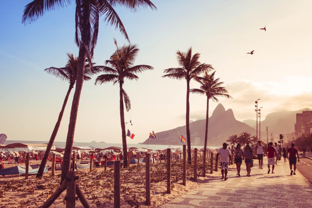 People relaxing at Copacabana Beach in Rio de Janeiro on a sunny day