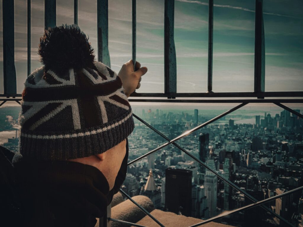 Traveler enjoying New York City skyline on a budget-friendly trip